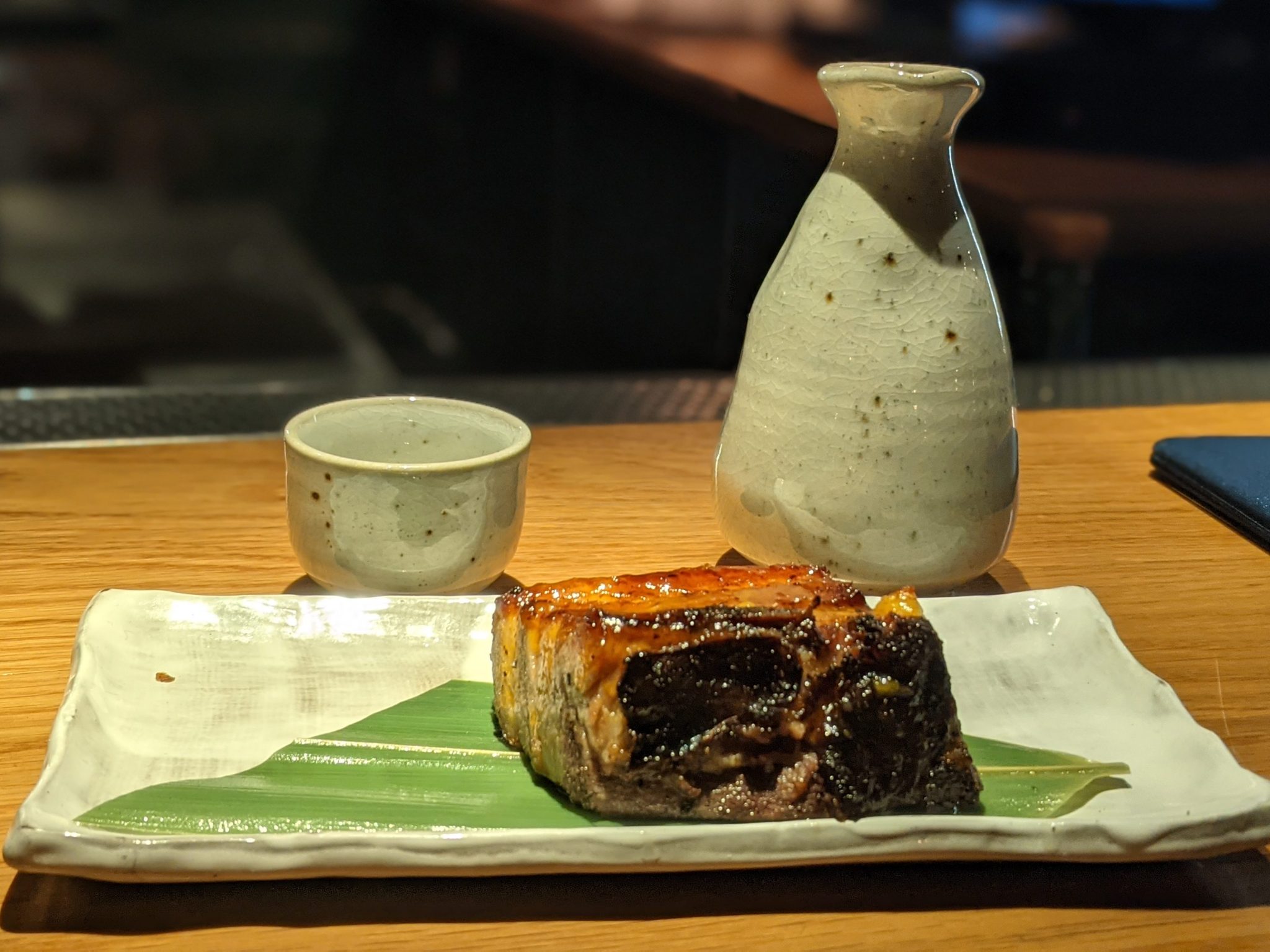 Warm sake with braised pork belly